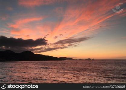 Pink sunset over Ile Rousse, Corsica
