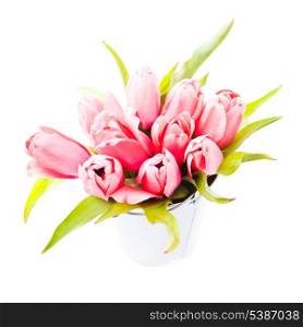 Pink tulips in decorative bucket close up