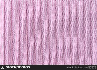 Pink vertical line knitting fabric texture background or knitted pattern background for design. Knitting or knitted