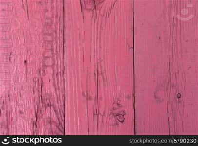 Pink wooden background of old boards