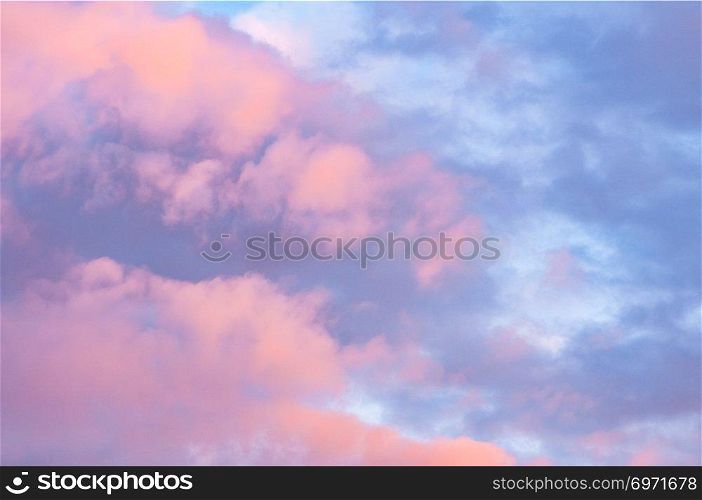 Pinky evening sky with scattered clouds