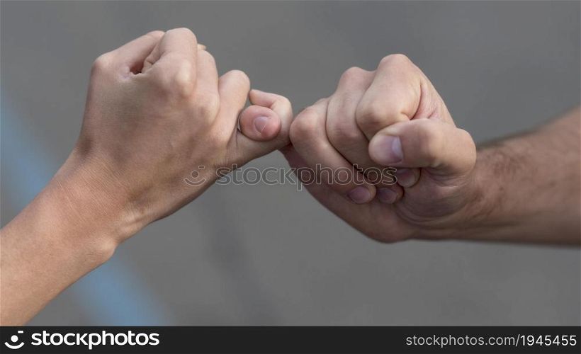pinky promise from man woman. High resolution photo. pinky promise from man woman. High quality photo