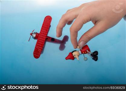 Pinocchio and a model airplane in water