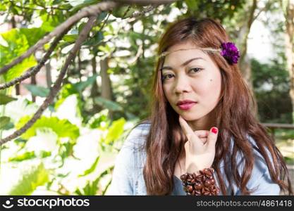 Pinoy woman in a green garden on farm