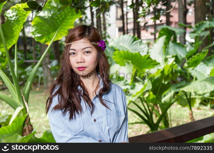 Pinoy woman in a green garden on farm