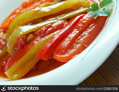 Piperade - typical Basque dish prepared with onion, green peppers, and tomatoes