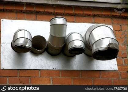 Pipes of ventilation are directed to different sides