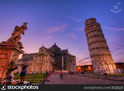 Pisa, Italy - July 8, 2018: Piazza dei miracoli, with the Basilica and the Leaning Tower, Pisa, Italy.