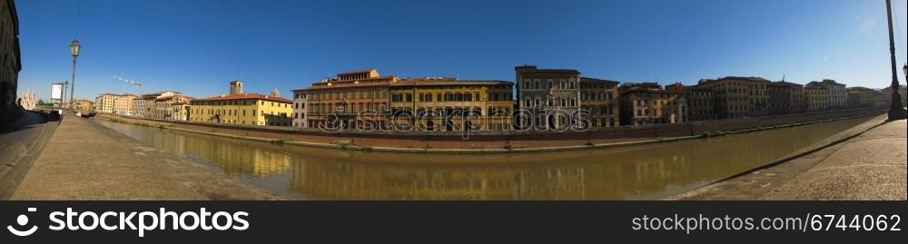 Pisa panoramic view across river Arno. panoramic view across the river arno in pisa, italy