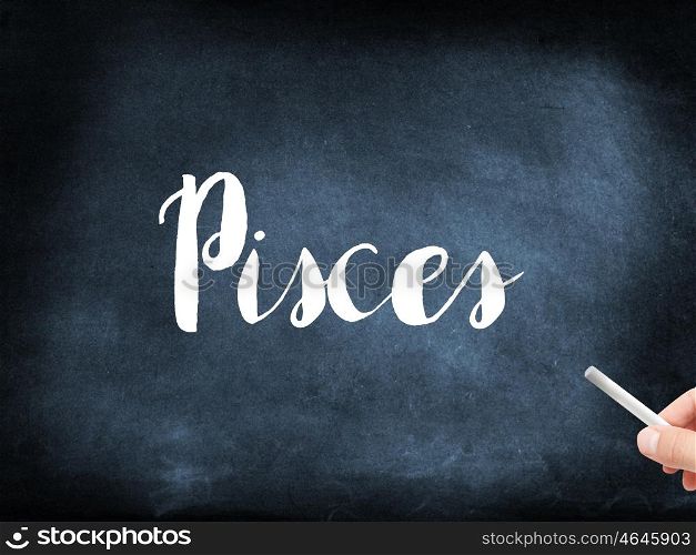 Pisces written on a blackboard
