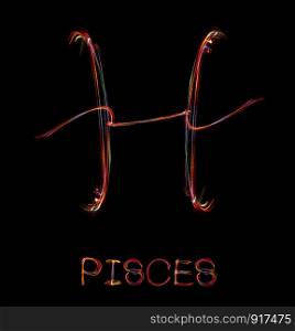 ""Pisces",Zodiac sign from led light on black background. "