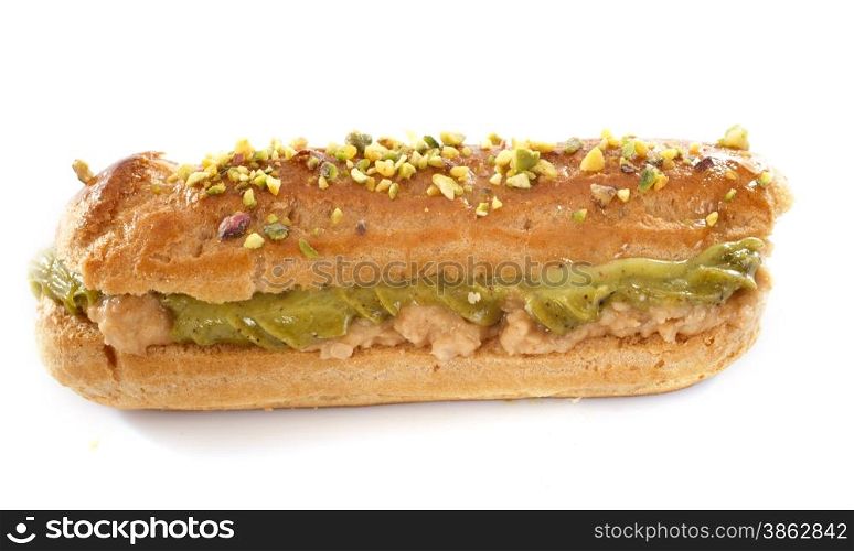 pistachio eclair in front of white background