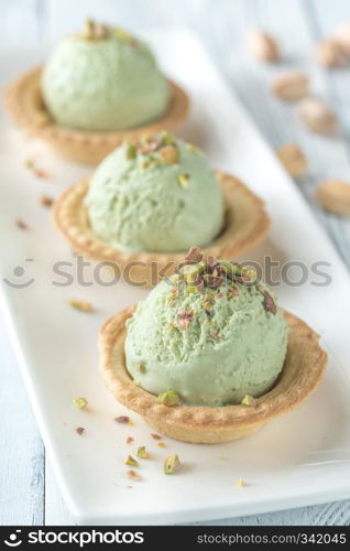 Pistachio ice cream in the pastry shells