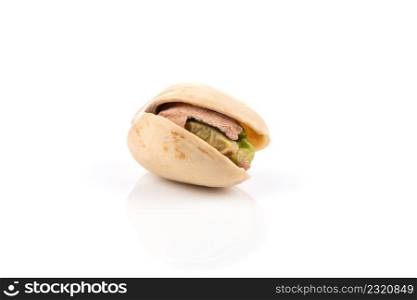 pistachio nut in shell close up isolated on white background