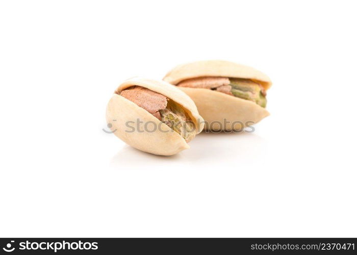 pistachio nut in shell close up isolated on white background