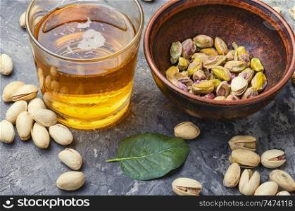Pistachio nuts,healthy snacks.Salted pistachios for beer.Pistachio nuts in the bowl. Pistachio nuts in a bowl