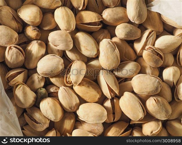 pistachios food background. many pistachios food useful as a background
