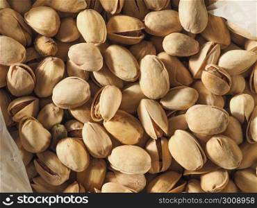 pistachios food background. many pistachios food useful as a background