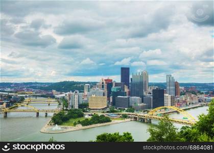 Pittsburgh cityscape with the Ohio river on a cloudy day