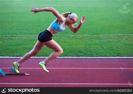 pixelated design of woman sprinter leaving starting blocks on the athletic track. Side view. exploding start
