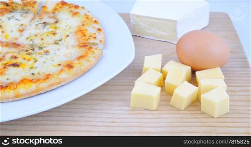 Pizza, cheese and egg.