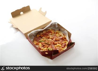pizza , chicken green pepper pineapple in box isolated in white background