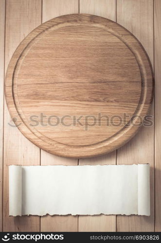 pizza cutting board on wooden background