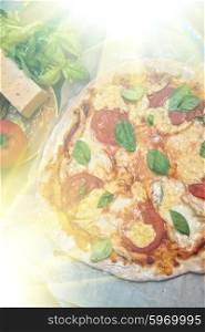 pizza margarita closeup. rustic italian pizza with mozzarella cheese tomato and basil leaves