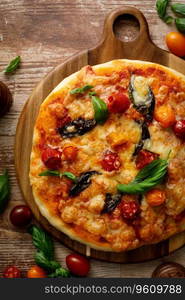 Pizza Margherita on a wooden background