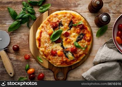 Pizza Margherita on a wooden background