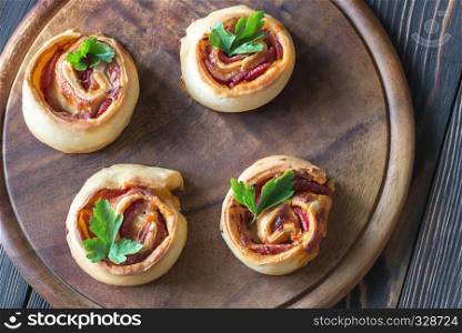 Pizza rolls on the wooden board