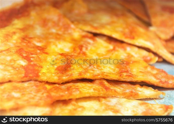 Pizza slices on the plate. Food background