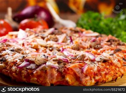 pizza with bacon, mushrooms and vegetables
