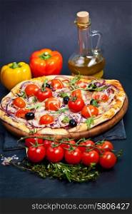 Pizza with cherry tomatoes and arugula