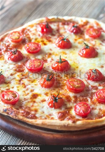 Pizza with cherry tomatoes and mozzarella