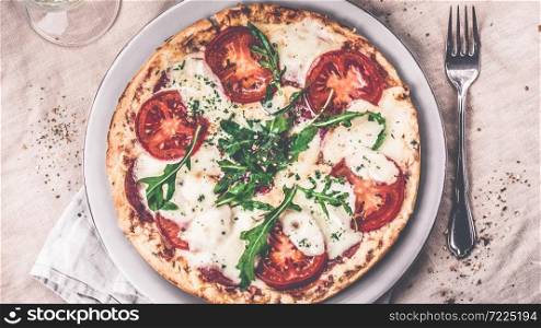 pizza with fresh tomato basil and mozzarella