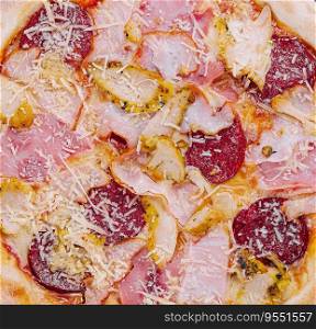 pizza with ham, pepperoni and chicken