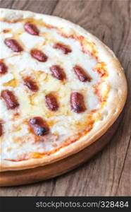Pizza with mozzarella and salami