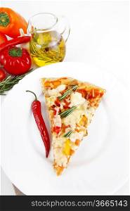 Pizza with tuna and paprika isolated over white background.