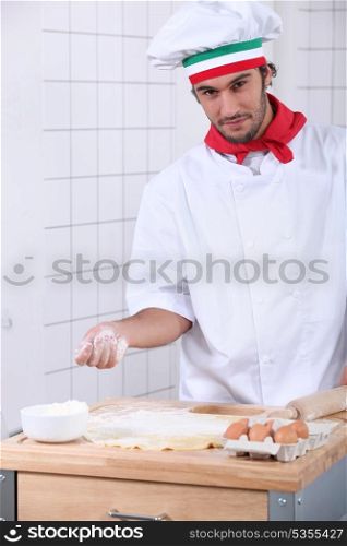 pizzaiolo preparing pizza