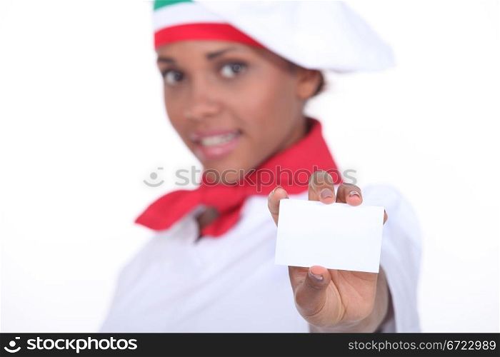 Pizzeria chef holding business card