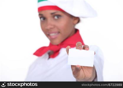 Pizzeria chef holding business card