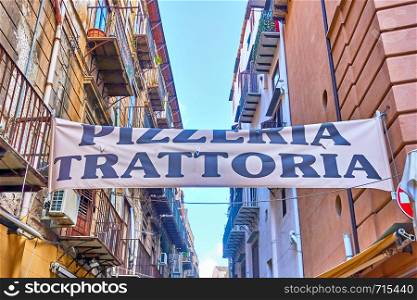 Pizzeria - trattoria (cafe) banner in the street in Palermo, Italy