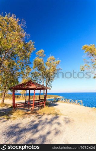 Place to relax on the coast near the water. Roofed arbor, gazebo with seating. C&ing spot in greece.. Relaxation place in Greece