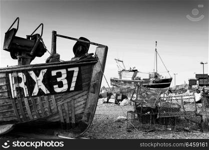 Places. Fishing boats and equipment on Hastings beach landscape at dawn