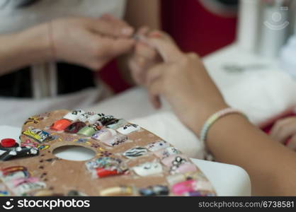 Placing nails and large collection of nails.Manicure