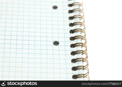 plaid notebook with a spiral isolated on white