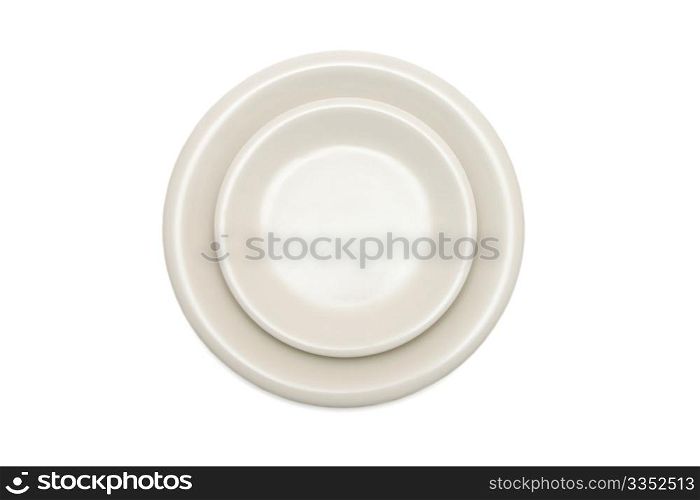 Plain beige dinner plate and saucer isolated top view