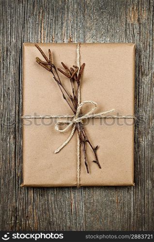 Plain gift with natural decorations