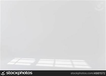 Plain white background with sun light and shadows